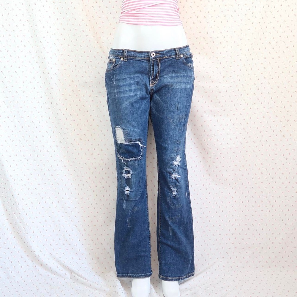 vintage y2k distressed low rise flared blue jeans